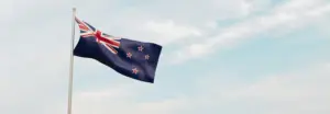 A New Zealand flag on a mast